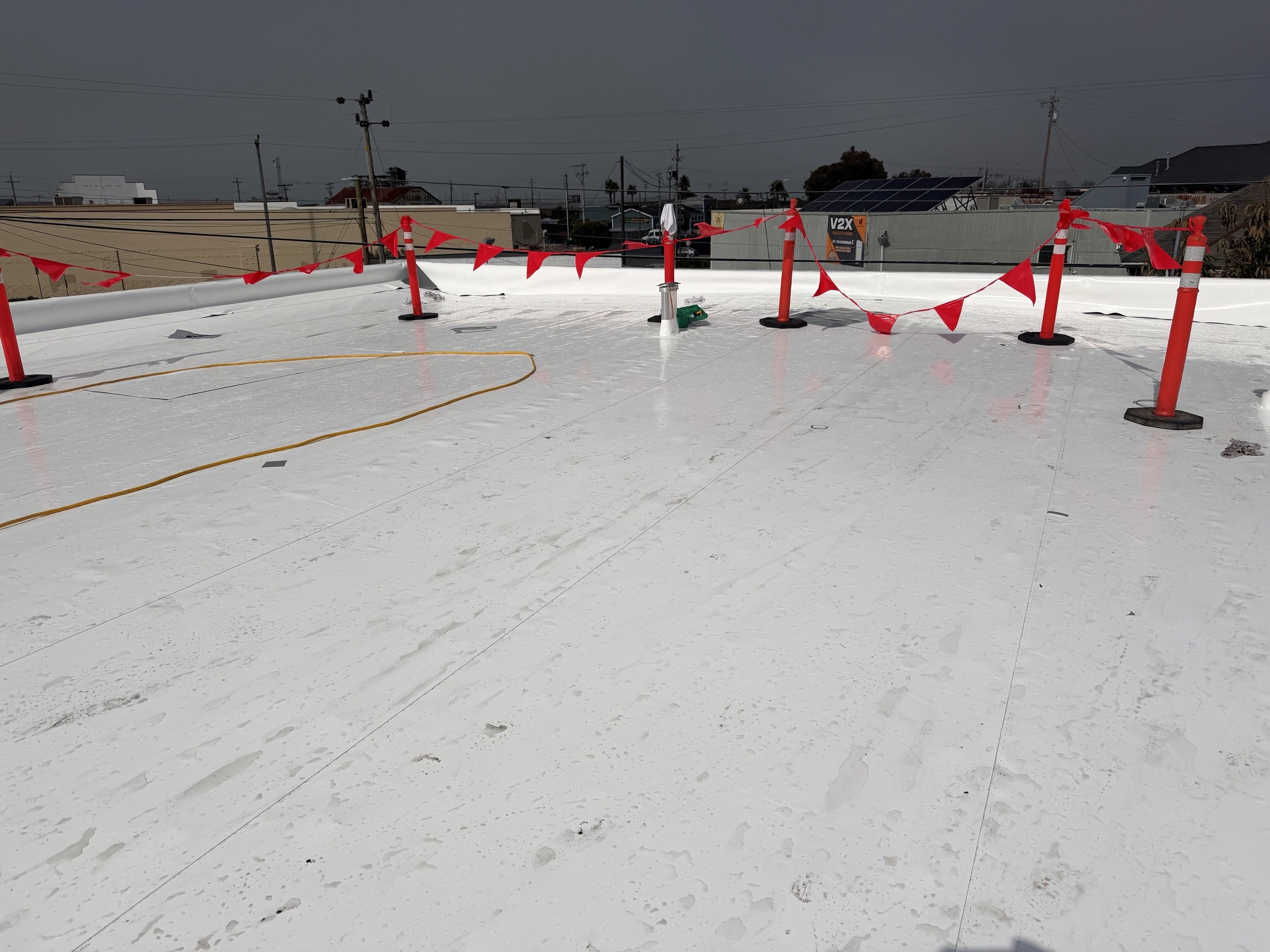 Versico 60mil PVC commercial flat roof installation — view 1